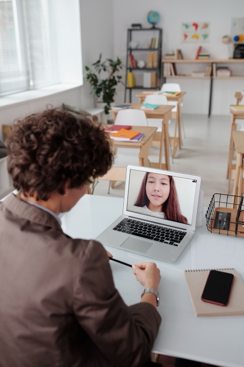 Tutor teaching from a classroom
